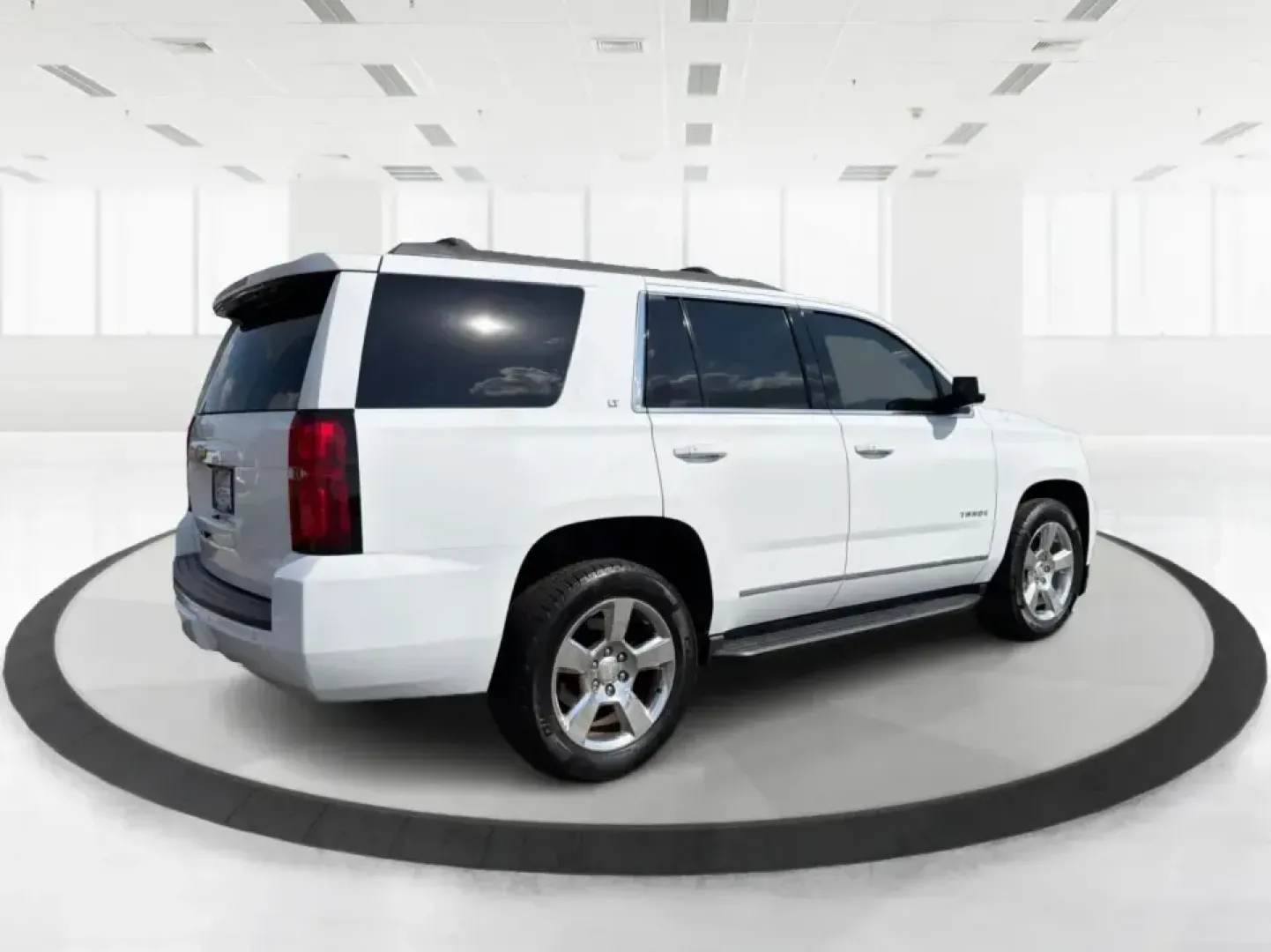 2016 Chevrolet Tahoe LT (1GNSKBKC8GR) with an EcoTec3 5.3L V-8 gasoline direct injection engine, 6A transmission, located at 401 Woodman Dr, Riverside, OH, 45431, (937) 908-9800, 39.760899, -84.123421 - If your weekends look like youth sports in the morning, a grocery run in the afternoon, and a last-minute road trip after dinner, this 2016 Chevrolet Tahoe LT 4WD is the kind of full-size SUV that keeps up with real life in Piqua. Finished in Summit White and built for comfort, capability, and confi - Photo#2