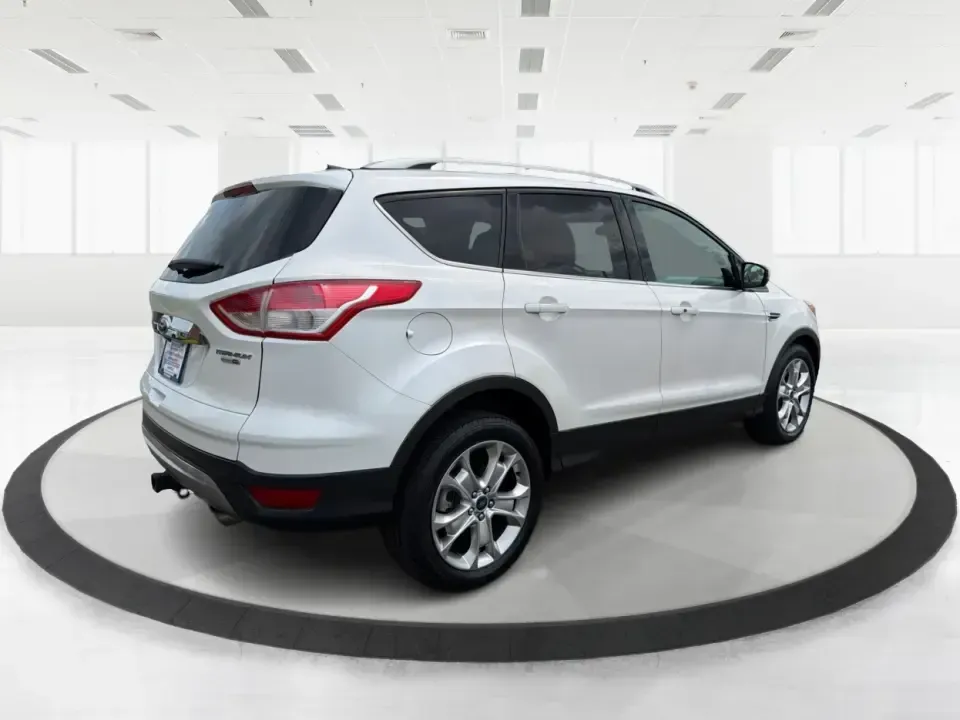 2014 Ford Escape Titanium (1FMCU9J92EU) with an 2.0L L4 DOHC 16V engine, 6-Speed Automatic transmission, located at 1951 S Dayton Lakeview Rd., New Carlisle, OH, 45344, (937) 908-9800, 39.890999, -84.050255 - Weekend escapes, daily commutes down I70, or family errands between New Carlisle and Huber Heights feel a whole lot easier when your SUV is comfortable, capable, and packed with the features you actually use. This 2014 Ford Escape Titanium 4WD is built for real life in Ohio-whether you're heading to - Photo#2