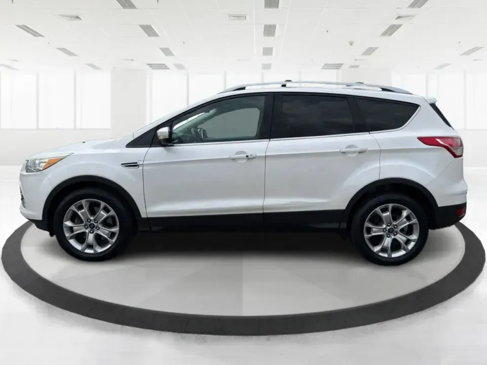 2014 Ford Escape Titanium (1FMCU9J92EU) with an 2.0L L4 DOHC 16V engine, 6-Speed Automatic transmission, located at 1951 S Dayton Lakeview Rd., New Carlisle, OH, 45344, (937) 908-9800, 39.890999, -84.050255 - Weekend escapes, daily commutes down I70, or family errands between New Carlisle and Huber Heights feel a whole lot easier when your SUV is comfortable, capable, and packed with the features you actually use. This 2014 Ford Escape Titanium 4WD is built for real life in Ohio-whether you're heading to - Photo#5