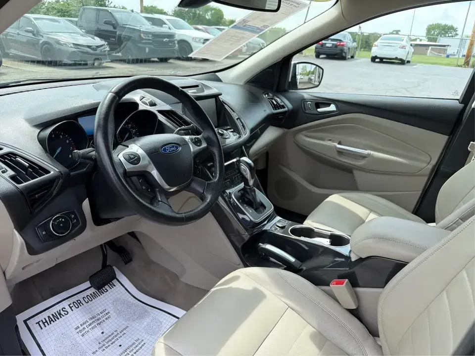 2014 Ford Escape Titanium (1FMCU9J92EU) with an 2.0L L4 DOHC 16V engine, 6-Speed Automatic transmission, located at 1951 S Dayton Lakeview Rd., New Carlisle, OH, 45344, (937) 908-9800, 39.890999, -84.050255 - Weekend escapes, daily commutes down I70, or family errands between New Carlisle and Huber Heights feel a whole lot easier when your SUV is comfortable, capable, and packed with the features you actually use. This 2014 Ford Escape Titanium 4WD is built for real life in Ohio-whether you're heading to - Photo#9