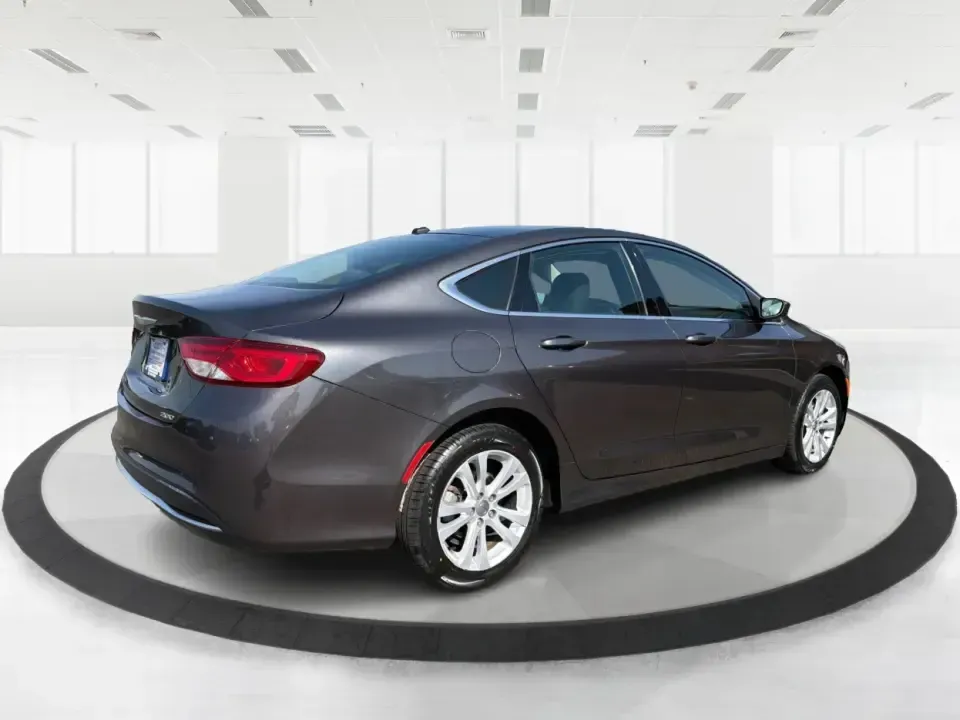 2015 Chrysler 200 Limited (1C3CCCAB6FN) with an 2.4L L4 DOHC 16V engine, 9-Speed Automatic transmission, located at 1099 N County Rd 25A , Troy, OH, 45373, (937) 908-9800, 40.057079, -84.212883 - Picture your next week: an easy I-75 commute, a comfortable run to Meijer, and a weekend cruise past the Miami County Fairgrounds-without stressing about how you'll get approved. This 2015 Chrysler 200 Limited is built for real life in Troy, Ohio: smooth, quiet, and efficient enough for daily drivin - Photo#2