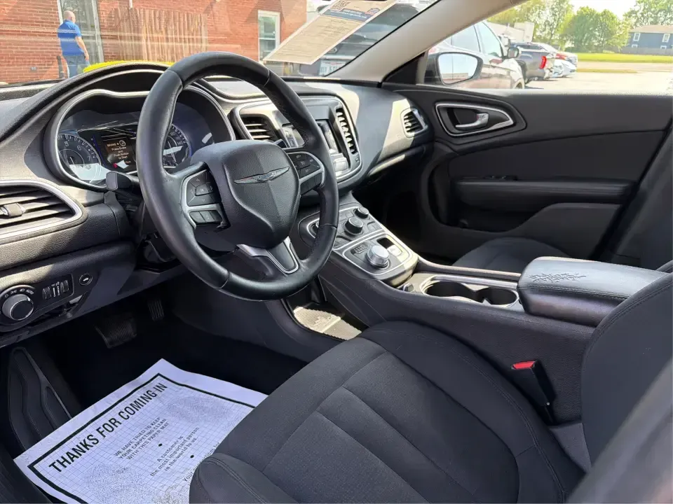 2015 Chrysler 200 Limited (1C3CCCAB6FN) with an 2.4L L4 DOHC 16V engine, 9-Speed Automatic transmission, located at 1099 N County Rd 25A , Troy, OH, 45373, (937) 908-9800, 40.057079, -84.212883 - Picture your next week: an easy I-75 commute, a comfortable run to Meijer, and a weekend cruise past the Miami County Fairgrounds-without stressing about how you'll get approved. This 2015 Chrysler 200 Limited is built for real life in Troy, Ohio: smooth, quiet, and efficient enough for daily drivin - Photo#9