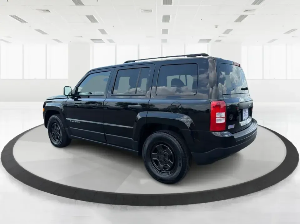 2014 Jeep Patriot Sport (1C4NJPBB0ED) with an 2.4L L4 DOHC 16V engine, located at 880 E. National Road, Vandalia, OH, 45377, (937) 908-9800, 39.891918, -84.183594 - Weekend getaways to the MetroParks, daily commutes down I75, or school-dropoff runs around Vandalia-this 2014 Jeep Patriot Sport is built for the kind of real-life driving that mixes practicality with a little adventure. Finished in Black Clearcoat with a versatile SUV body style, it's an easy fit f - Photo#4