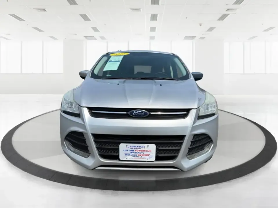 2015 Ford Escape SE (1FMCU9G98FU) with an 2.0L L4 DOHC 16V engine, 6-Speed Automatic transmission, located at 1099 N County Rd 25A , Troy, OH, 45373, (937) 908-9800, 40.057079, -84.212883 - Weekday commutes down I75, school drop-offs around Troy City Schools, and spontaneous weekend trips to Charleston Falls Preserve all get easier when you have an SUV that's the right size, the right power, and the right fit for your budget. This 2015 Ford Escape SE in Ingot Silver is built for real-l - Photo#7