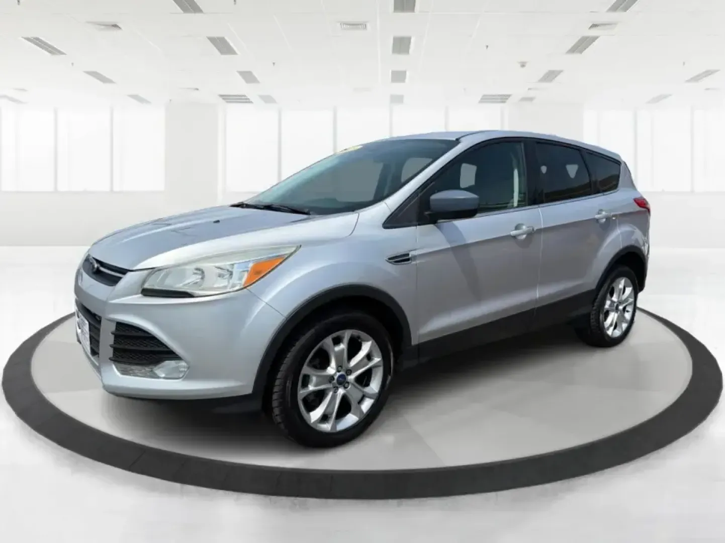 2015 Ford Escape SE (1FMCU9G98FU) with an 2.0L L4 DOHC 16V engine, 6-Speed Automatic transmission, located at 1099 N County Rd 25A , Troy, OH, 45373, (937) 908-9800, 40.057079, -84.212883 - Weekday commutes down I75, school drop-offs around Troy City Schools, and spontaneous weekend trips to Charleston Falls Preserve all get easier when you have an SUV that's the right size, the right power, and the right fit for your budget. This 2015 Ford Escape SE in Ingot Silver is built for real-l - Photo#8