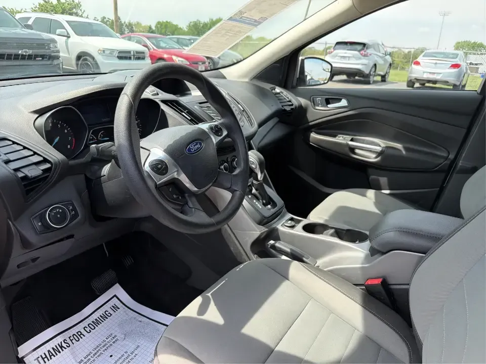 2015 Ford Escape SE (1FMCU9G98FU) with an 2.0L L4 DOHC 16V engine, 6-Speed Automatic transmission, located at 1099 N County Rd 25A , Troy, OH, 45373, (937) 908-9800, 40.057079, -84.212883 - Weekday commutes down I75, school drop-offs around Troy City Schools, and spontaneous weekend trips to Charleston Falls Preserve all get easier when you have an SUV that's the right size, the right power, and the right fit for your budget. This 2015 Ford Escape SE in Ingot Silver is built for real-l - Photo#9