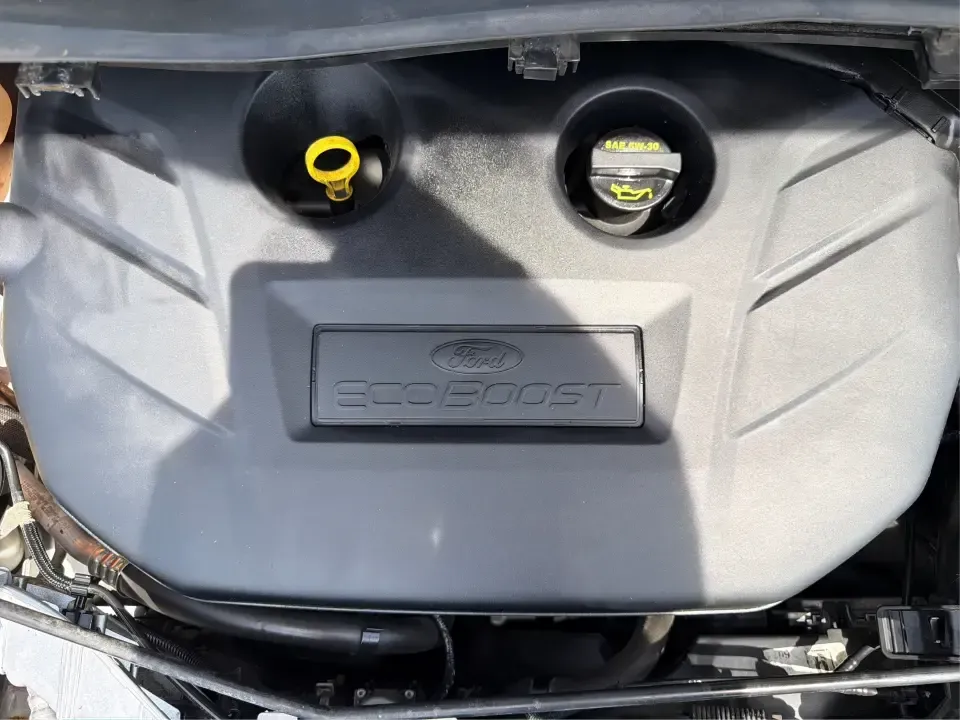 2015 Ford Escape SE (1FMCU9G98FU) with an 2.0L L4 DOHC 16V engine, 6-Speed Automatic transmission, located at 1099 N County Rd 25A , Troy, OH, 45373, (937) 908-9800, 40.057079, -84.212883 - Weekday commutes down I75, school drop-offs around Troy City Schools, and spontaneous weekend trips to Charleston Falls Preserve all get easier when you have an SUV that's the right size, the right power, and the right fit for your budget. This 2015 Ford Escape SE in Ingot Silver is built for real-l - Photo#11