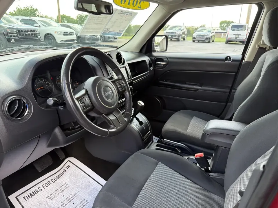 2016 Jeep Patriot Latitude 4WD (1C4NJRFB0GD) with an 2.4L L4 DOHC 16V engine, located at 880 E. National Road, Vandalia, OH, 45377, (937) 908-9800, 39.891918, -84.183594 - Picture your next weekend: you're loading up the cooler, tossing hiking boots in the back, and heading out of Vandalia with confidence-whether that means a quick run up I75, a family day at the Boonshoft Museum of Discovery, or a scenic drive toward Englewood MetroPark. If you want an SUV that fits- Photo#9