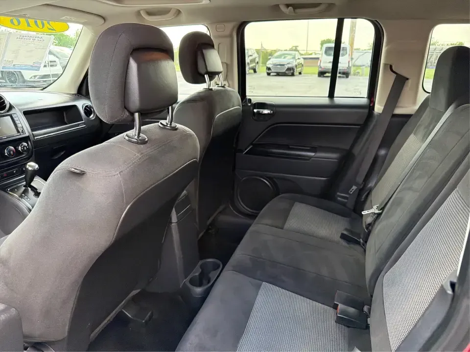 2016 Jeep Patriot Latitude 4WD (1C4NJRFB0GD) with an 2.4L L4 DOHC 16V engine, located at 880 E. National Road, Vandalia, OH, 45377, (937) 908-9800, 39.891918, -84.183594 - Picture your next weekend: you're loading up the cooler, tossing hiking boots in the back, and heading out of Vandalia with confidence-whether that means a quick run up I75, a family day at the Boonshoft Museum of Discovery, or a scenic drive toward Englewood MetroPark. If you want an SUV that fits- Photo#10