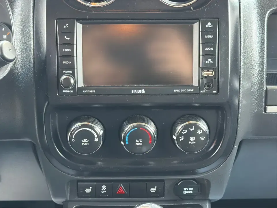 2016 Jeep Patriot Latitude 4WD (1C4NJRFB0GD) with an 2.4L L4 DOHC 16V engine, located at 880 E. National Road, Vandalia, OH, 45377, (937) 908-9800, 39.891918, -84.183594 - Picture your next weekend: you're loading up the cooler, tossing hiking boots in the back, and heading out of Vandalia with confidence-whether that means a quick run up I75, a family day at the Boonshoft Museum of Discovery, or a scenic drive toward Englewood MetroPark. If you want an SUV that fits- Photo#13