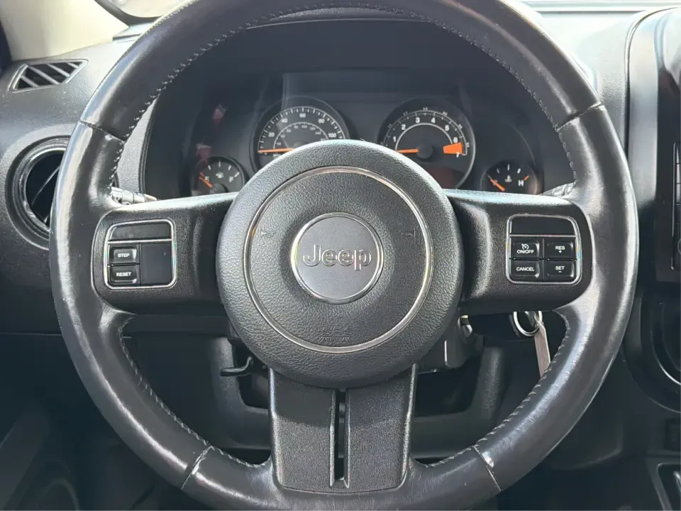 2016 Jeep Patriot Latitude 4WD (1C4NJRFB0GD) with an 2.4L L4 DOHC 16V engine, located at 880 E. National Road, Vandalia, OH, 45377, (937) 908-9800, 39.891918, -84.183594 - Picture your next weekend: you're loading up the cooler, tossing hiking boots in the back, and heading out of Vandalia with confidence-whether that means a quick run up I75, a family day at the Boonshoft Museum of Discovery, or a scenic drive toward Englewood MetroPark. If you want an SUV that fits- Photo#16