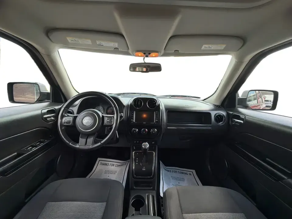 2016 Jeep Patriot Latitude 4WD (1C4NJRFB0GD) with an 2.4L L4 DOHC 16V engine, located at 880 E. National Road, Vandalia, OH, 45377, (937) 908-9800, 39.891918, -84.183594 - Picture your next weekend: you're loading up the cooler, tossing hiking boots in the back, and heading out of Vandalia with confidence-whether that means a quick run up I75, a family day at the Boonshoft Museum of Discovery, or a scenic drive toward Englewood MetroPark. If you want an SUV that fits- Photo#19