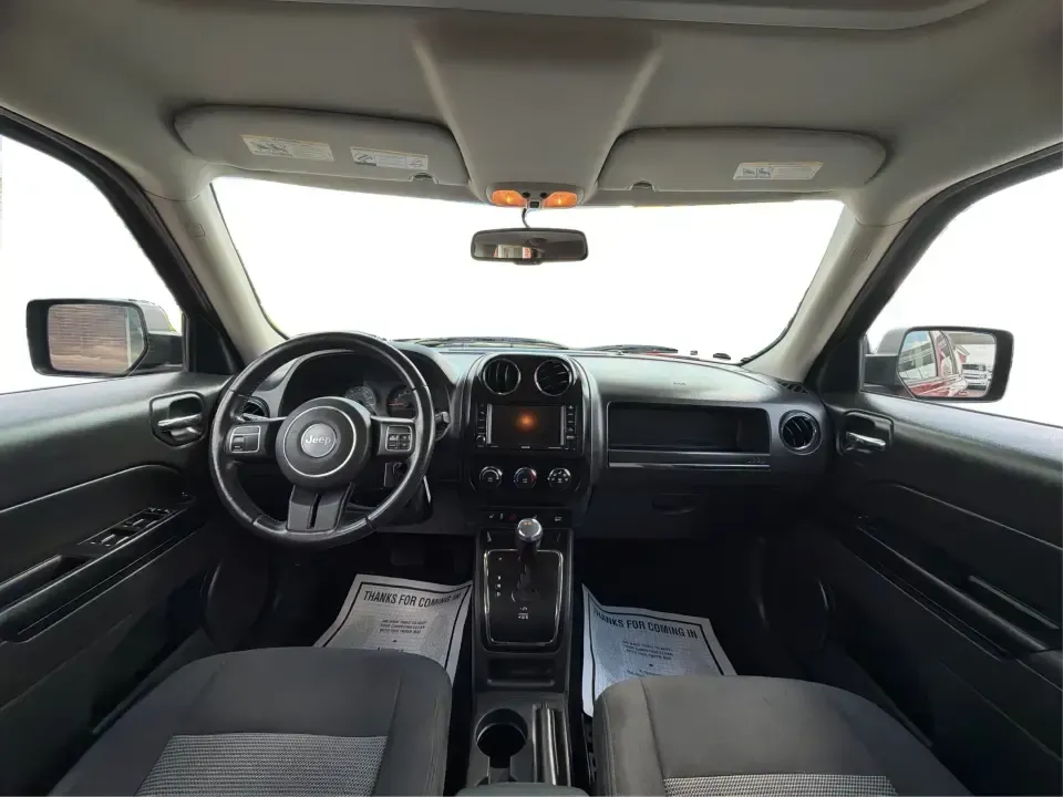 2016 Jeep Patriot Latitude 4WD (1C4NJRFB0GD) with an 2.4L L4 DOHC 16V engine, located at 880 E. National Road, Vandalia, OH, 45377, (937) 908-9800, 39.891918, -84.183594 - Picture your next weekend: you're loading up the cooler, tossing hiking boots in the back, and heading out of Vandalia with confidence-whether that means a quick run up I75, a family day at the Boonshoft Museum of Discovery, or a scenic drive toward Englewood MetroPark. If you want an SUV that fits- Photo#20