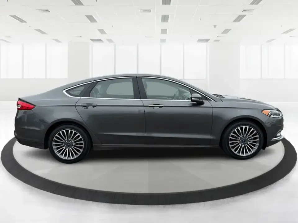 2017 Ford Fusion SE (3FA6P0H98HR) with an 2.0L L4 DOHC 16V engine, 6A transmission, located at 4508 South Dixie Dr, Moraine, OH, 45439, (937) 908-9800, 39.689976, -84.218452 - Picture your next week: a smooth, quiet commute down South Dixie Drive, quick errands to the Dayton Mall area, and a comfortable weekend drive toward Carillon Historical Park or a Reds day trip-without feeling like you're overpaying for a sedan that can't keep up. This 2017 Ford Fusion SE in sleek M - Photo#1