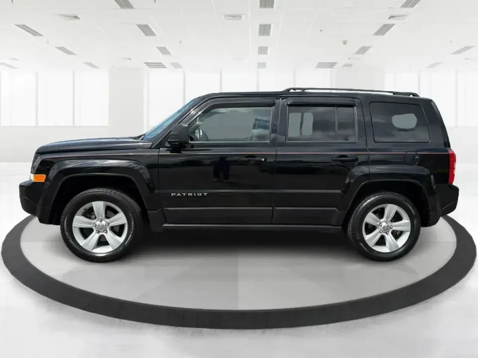 2014 Jeep Patriot Latitude (1C4NJRFB4ED) with an 2.4L I-4 DOHC engine, located at 8750 N County Rd 25A, Piqua, OH, 45356, (937) 908-9800, 40.164391, -84.232513 - Weekend adventures, winter commutes, and everyday errands feel a lot easier when you're in an SUV that's confident on Ohio backroads and comfortable in town. This **2014 Jeep Patriot Latitude 4WD** is a practical, go-anywhere choice for drivers who want Jeep capability without the full-size SUV foot - Photo#5