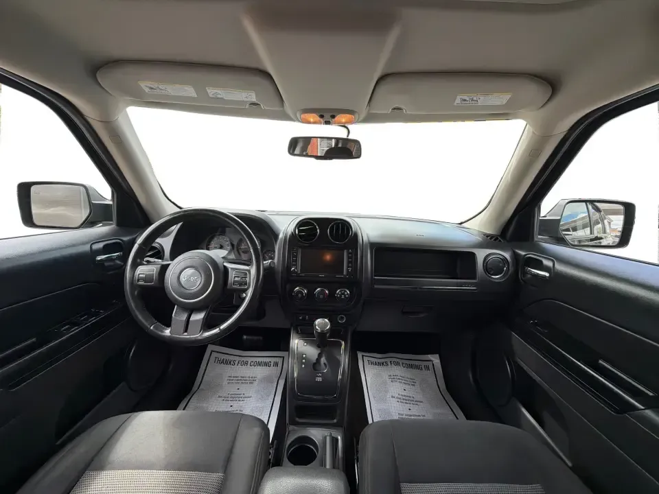 2014 Jeep Patriot Latitude (1C4NJRFB4ED) with an 2.4L I-4 DOHC engine, located at 8750 N County Rd 25A, Piqua, OH, 45356, (937) 908-9800, 40.164391, -84.232513 - Weekend adventures, winter commutes, and everyday errands feel a lot easier when you're in an SUV that's confident on Ohio backroads and comfortable in town. This **2014 Jeep Patriot Latitude 4WD** is a practical, go-anywhere choice for drivers who want Jeep capability without the full-size SUV foot - Photo#19