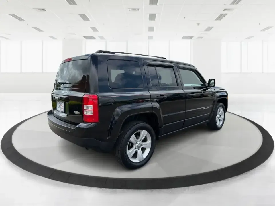 2014 Jeep Patriot Latitude 4WD (1C4NJRFB4ED) with an 2.4L L4 DOHC 16V engine, located at 1951 S Dayton Lakeview Rd., New Carlisle, OH, 45344, (937) 908-9800, 39.890999, -84.050255 - Need a practical SUV that can handle Ohio weather, weekday commutes, and spur-of-the-moment weekend plans? This 2014 Jeep Patriot Latitude 4WD is built for real life in and around New Carlisle-whether you're shuttling kids to school, tackling a long drive to Dayton for work, or loading up for a day- Photo#2