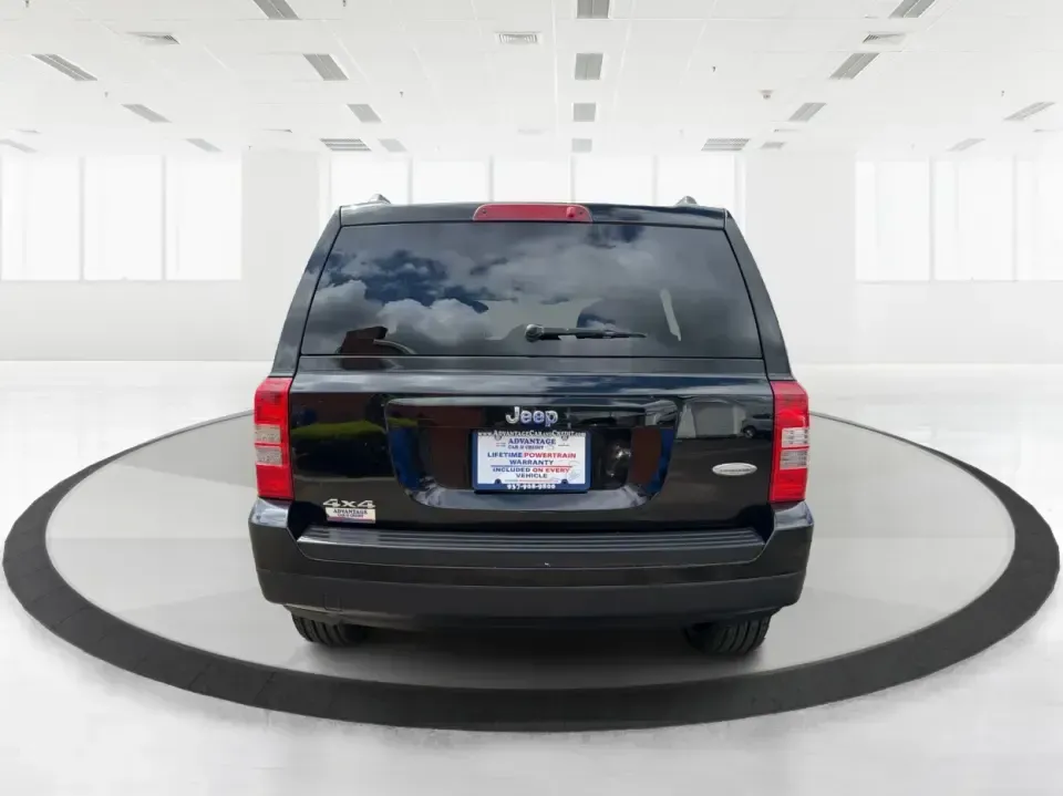2014 Jeep Patriot Latitude 4WD (1C4NJRFB4ED) with an 2.4L L4 DOHC 16V engine, located at 1951 S Dayton Lakeview Rd., New Carlisle, OH, 45344, (937) 908-9800, 39.890999, -84.050255 - Need a practical SUV that can handle Ohio weather, weekday commutes, and spur-of-the-moment weekend plans? This 2014 Jeep Patriot Latitude 4WD is built for real life in and around New Carlisle-whether you're shuttling kids to school, tackling a long drive to Dayton for work, or loading up for a day- Photo#3