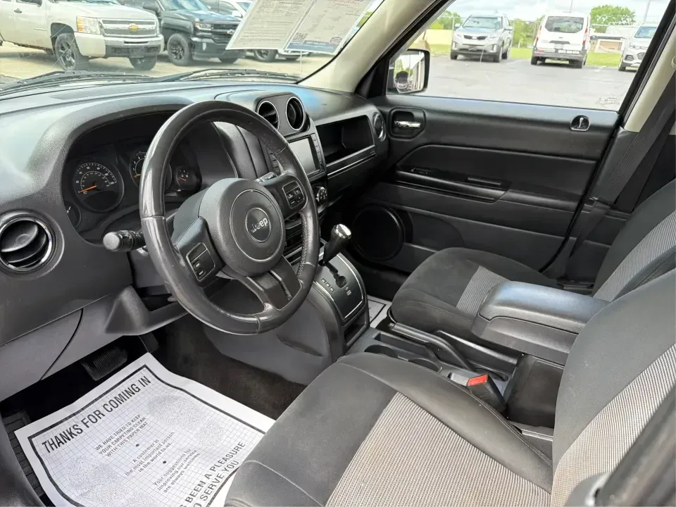 2014 Jeep Patriot Latitude 4WD (1C4NJRFB4ED) with an 2.4L L4 DOHC 16V engine, located at 1951 S Dayton Lakeview Rd., New Carlisle, OH, 45344, (937) 908-9800, 39.890999, -84.050255 - Need a practical SUV that can handle Ohio weather, weekday commutes, and spur-of-the-moment weekend plans? This 2014 Jeep Patriot Latitude 4WD is built for real life in and around New Carlisle-whether you're shuttling kids to school, tackling a long drive to Dayton for work, or loading up for a day- Photo#9