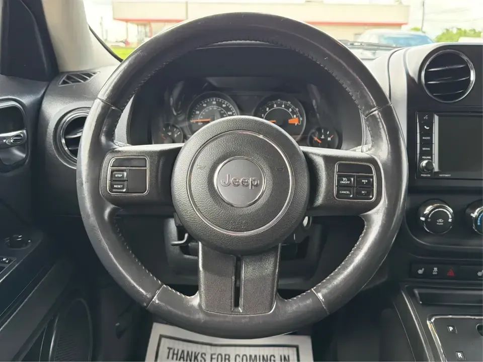 2014 Jeep Patriot Latitude 4WD (1C4NJRFB4ED) with an 2.4L L4 DOHC 16V engine, located at 1951 S Dayton Lakeview Rd., New Carlisle, OH, 45344, (937) 908-9800, 39.890999, -84.050255 - Need a practical SUV that can handle Ohio weather, weekday commutes, and spur-of-the-moment weekend plans? This 2014 Jeep Patriot Latitude 4WD is built for real life in and around New Carlisle-whether you're shuttling kids to school, tackling a long drive to Dayton for work, or loading up for a day- Photo#16