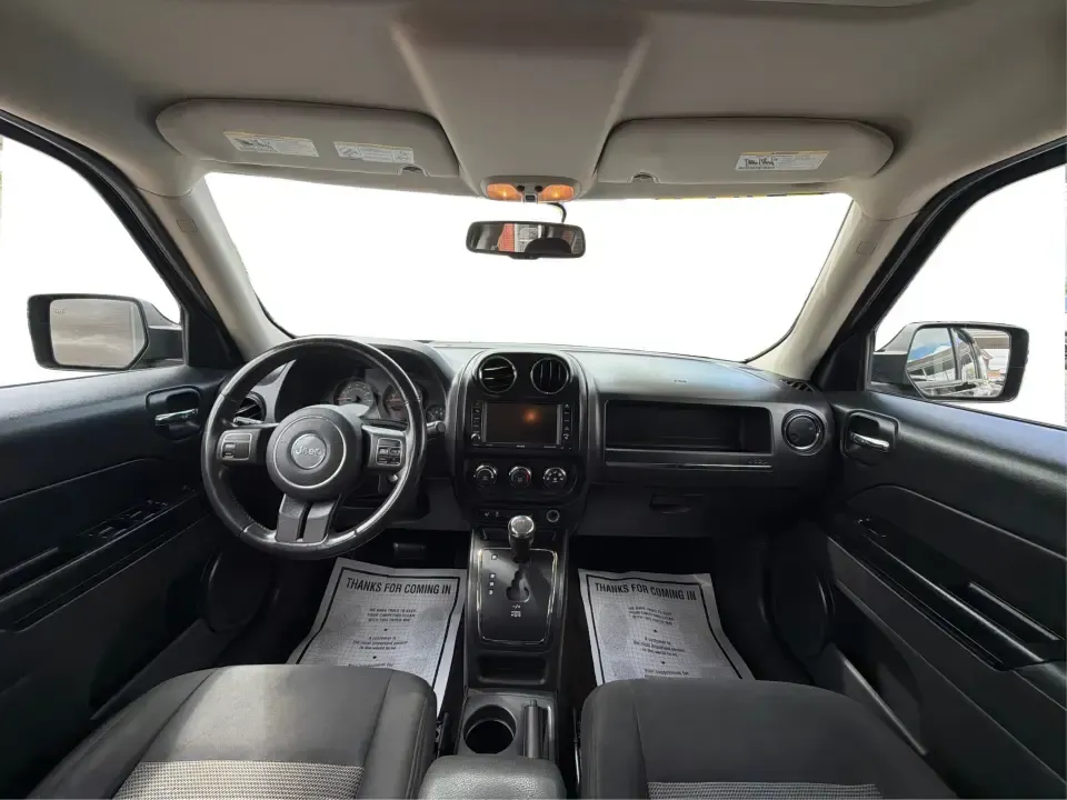 2014 Jeep Patriot Latitude 4WD (1C4NJRFB4ED) with an 2.4L L4 DOHC 16V engine, located at 1951 S Dayton Lakeview Rd., New Carlisle, OH, 45344, (937) 908-9800, 39.890999, -84.050255 - Need a practical SUV that can handle Ohio weather, weekday commutes, and spur-of-the-moment weekend plans? This 2014 Jeep Patriot Latitude 4WD is built for real life in and around New Carlisle-whether you're shuttling kids to school, tackling a long drive to Dayton for work, or loading up for a day- Photo#20