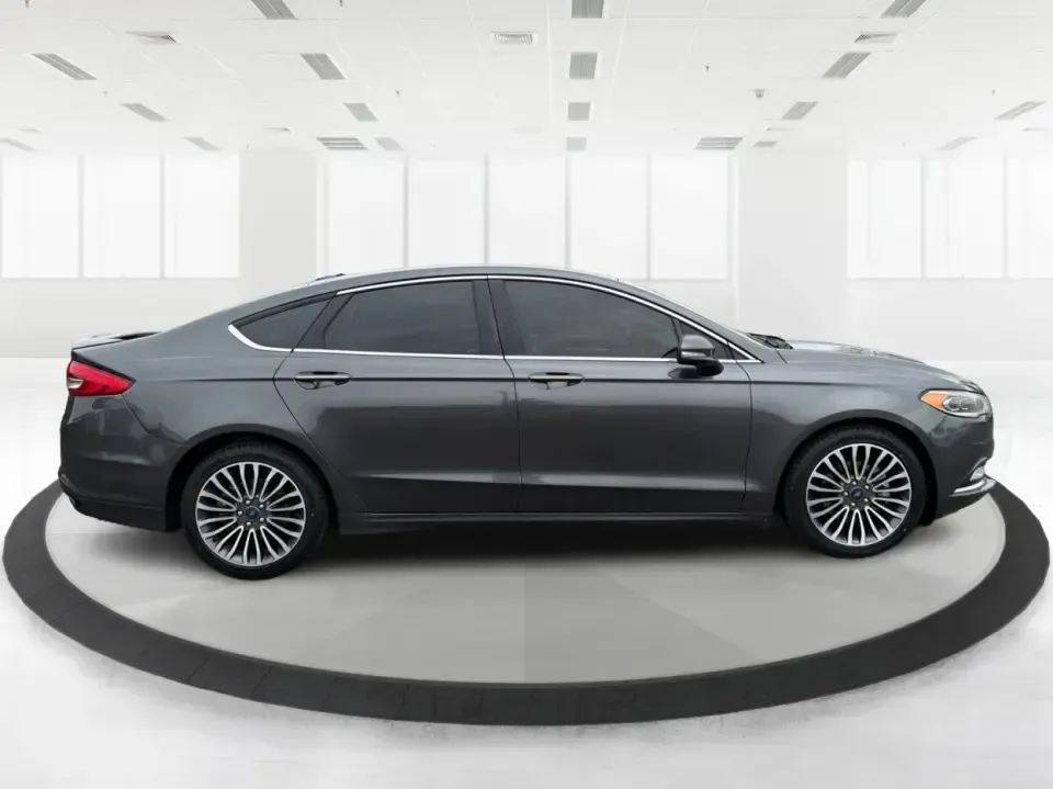 2018 Ford Fusion Titanium AWD (3FA6P0D9XJR) with an 2.0L L4 DOHC 16V engine, 6-Speed Automatic transmission, located at 1951 S Dayton Lakeview Rd., New Carlisle, OH, 45344, (937) 908-9800, 39.890999, -84.050255 - Picture a comfortable, capable sedan that makes daily commutes down I70 feel easy, keeps weekend plans on track, and still looks sharp pulling into dinner in nearby Huber Heights or downtown Dayton. This **2018 Ford Fusion Titanium AWD** is built for real-life driving in Ohio-whether you're navigati - Photo#1