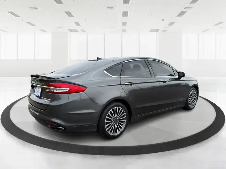 2018 Ford Fusion Titanium AWD (3FA6P0D9XJR) with an 2.0L L4 DOHC 16V engine, 6-Speed Automatic transmission, located at 1951 S Dayton Lakeview Rd., New Carlisle, OH, 45344, (937) 908-9800, 39.890999, -84.050255 - Picture a comfortable, capable sedan that makes daily commutes down I70 feel easy, keeps weekend plans on track, and still looks sharp pulling into dinner in nearby Huber Heights or downtown Dayton. This **2018 Ford Fusion Titanium AWD** is built for real-life driving in Ohio-whether you're navigati - Photo#2