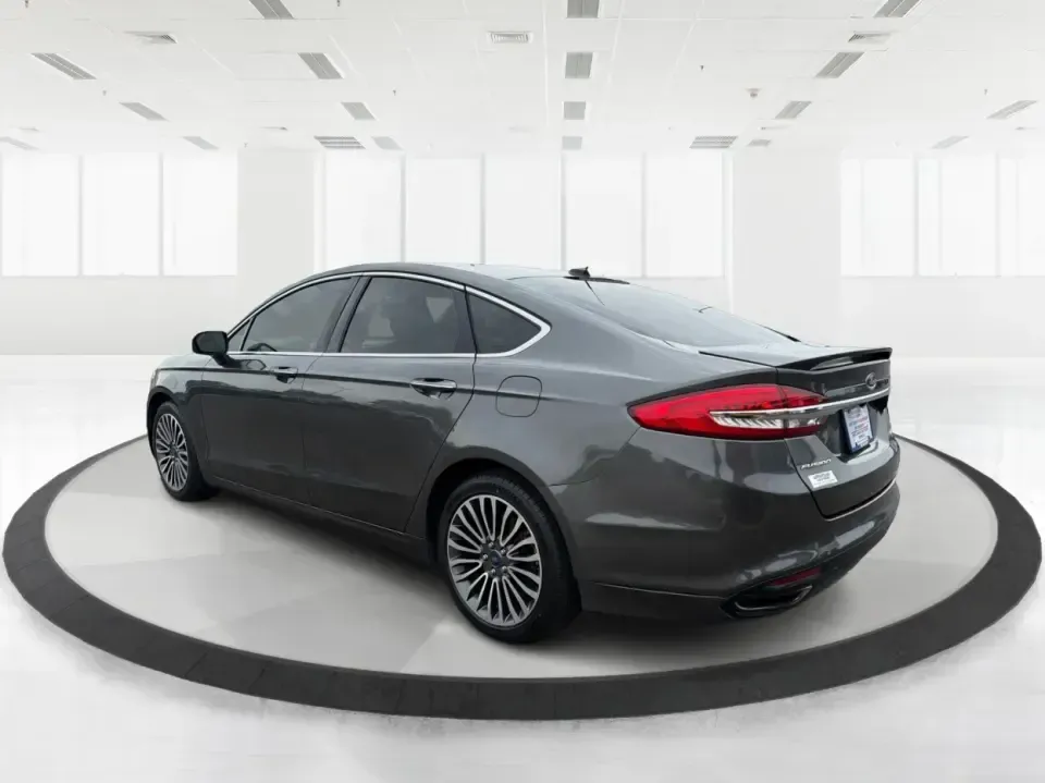 2018 Ford Fusion Titanium AWD (3FA6P0D9XJR) with an 2.0L L4 DOHC 16V engine, 6-Speed Automatic transmission, located at 1951 S Dayton Lakeview Rd., New Carlisle, OH, 45344, (937) 908-9800, 39.890999, -84.050255 - Picture a comfortable, capable sedan that makes daily commutes down I70 feel easy, keeps weekend plans on track, and still looks sharp pulling into dinner in nearby Huber Heights or downtown Dayton. This **2018 Ford Fusion Titanium AWD** is built for real-life driving in Ohio-whether you're navigati - Photo#4