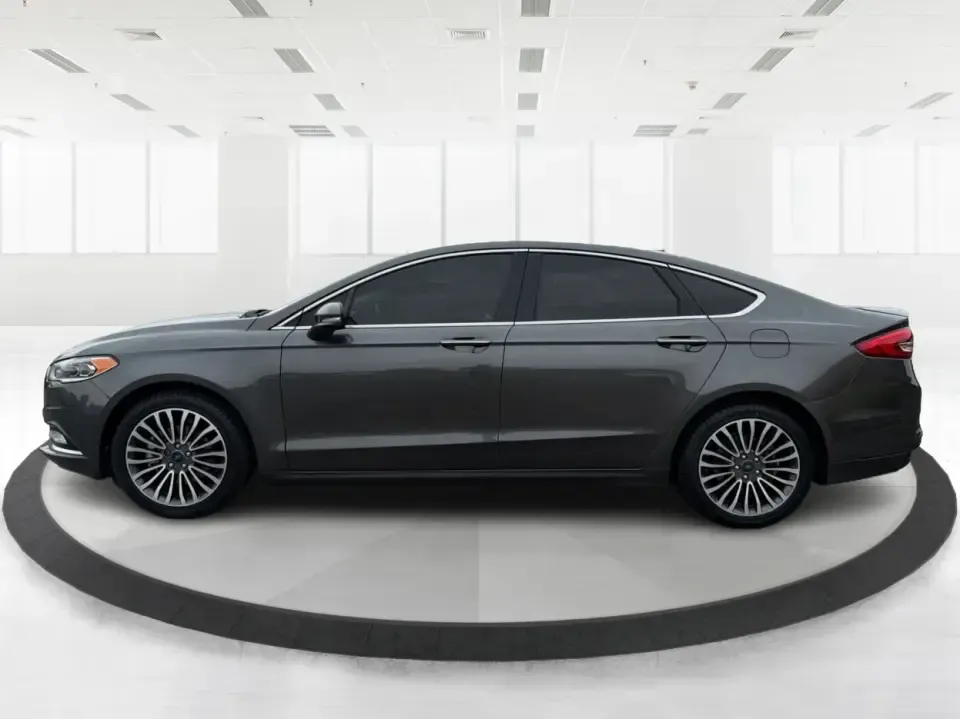 2018 Ford Fusion Titanium AWD (3FA6P0D9XJR) with an 2.0L L4 DOHC 16V engine, 6-Speed Automatic transmission, located at 1951 S Dayton Lakeview Rd., New Carlisle, OH, 45344, (937) 908-9800, 39.890999, -84.050255 - Picture a comfortable, capable sedan that makes daily commutes down I70 feel easy, keeps weekend plans on track, and still looks sharp pulling into dinner in nearby Huber Heights or downtown Dayton. This **2018 Ford Fusion Titanium AWD** is built for real-life driving in Ohio-whether you're navigati - Photo#5