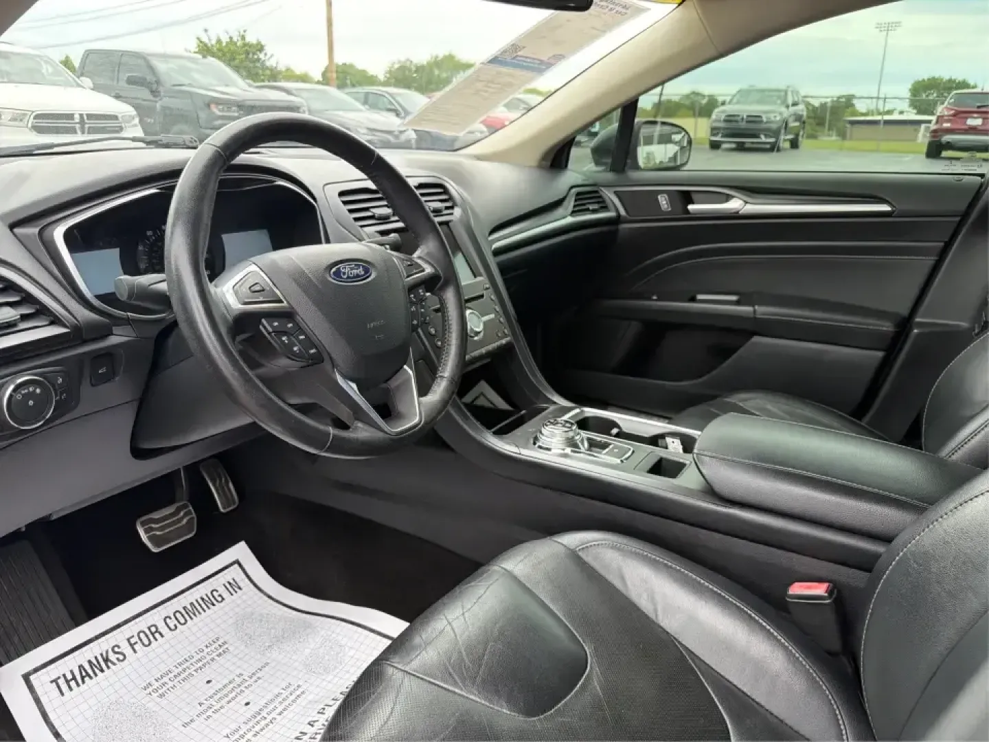 2018 Ford Fusion Titanium AWD (3FA6P0D9XJR) with an 2.0L L4 DOHC 16V engine, 6-Speed Automatic transmission, located at 8750 N County Rd 25A, Piqua, OH, 45356, (937) 908-9800, 40.164391, -84.232513 - Picture a comfortable, capable sedan that makes daily commutes down I70 feel easy, keeps weekend plans on track, and still looks sharp pulling into dinner in nearby Huber Heights or downtown Dayton. This **2018 Ford Fusion Titanium AWD** is built for real-life driving in Ohio-whether you're navigati - Photo#9
