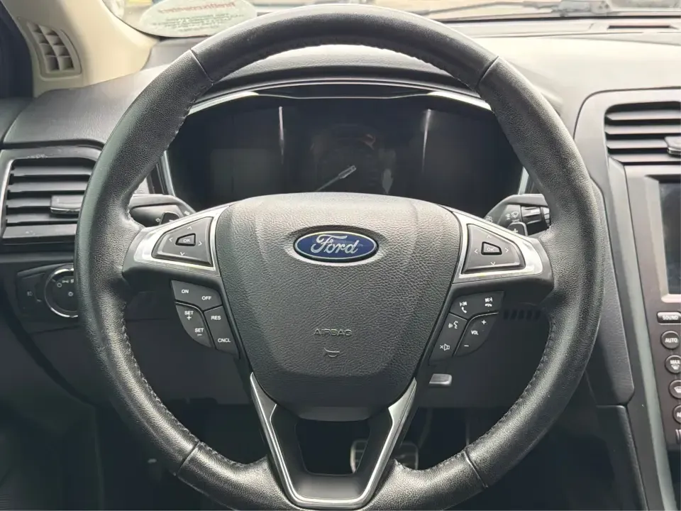 2018 Ford Fusion Titanium AWD (3FA6P0D9XJR) with an 2.0L L4 DOHC 16V engine, 6-Speed Automatic transmission, located at 1951 S Dayton Lakeview Rd., New Carlisle, OH, 45344, (937) 908-9800, 39.890999, -84.050255 - Picture a comfortable, capable sedan that makes daily commutes down I70 feel easy, keeps weekend plans on track, and still looks sharp pulling into dinner in nearby Huber Heights or downtown Dayton. This **2018 Ford Fusion Titanium AWD** is built for real-life driving in Ohio-whether you're navigati - Photo#16