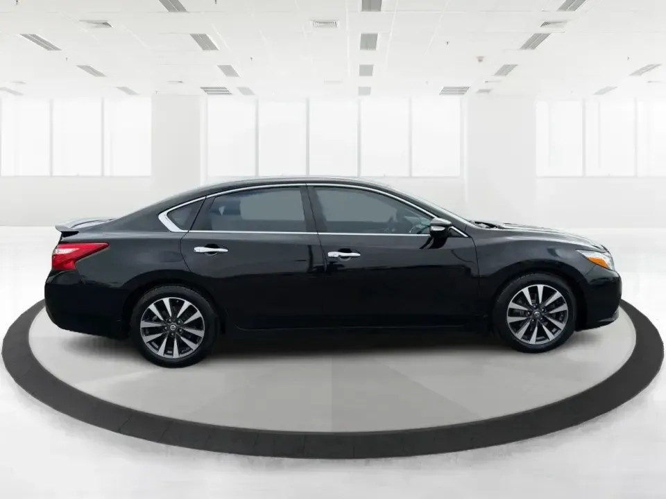 2016 Nissan Altima 2.5 SL (1N4AL3AP1GC) with an 2.5L I-4 DOHC engine, CVT transmission, located at 880 E. National Road, Vandalia, OH, 45377, (937) 908-9800, 39.891918, -84.183594 - Whether you're a Dayton-area commuter stacking highway miles, a busy parent shuttling kids between school and practice, or a weekend road-trip planner who wants comfort without overspending, this **2016 Nissan Altima 2.5 SL** is built for real life. With a sleek **Super Black** exterior and an upsca - Photo#1