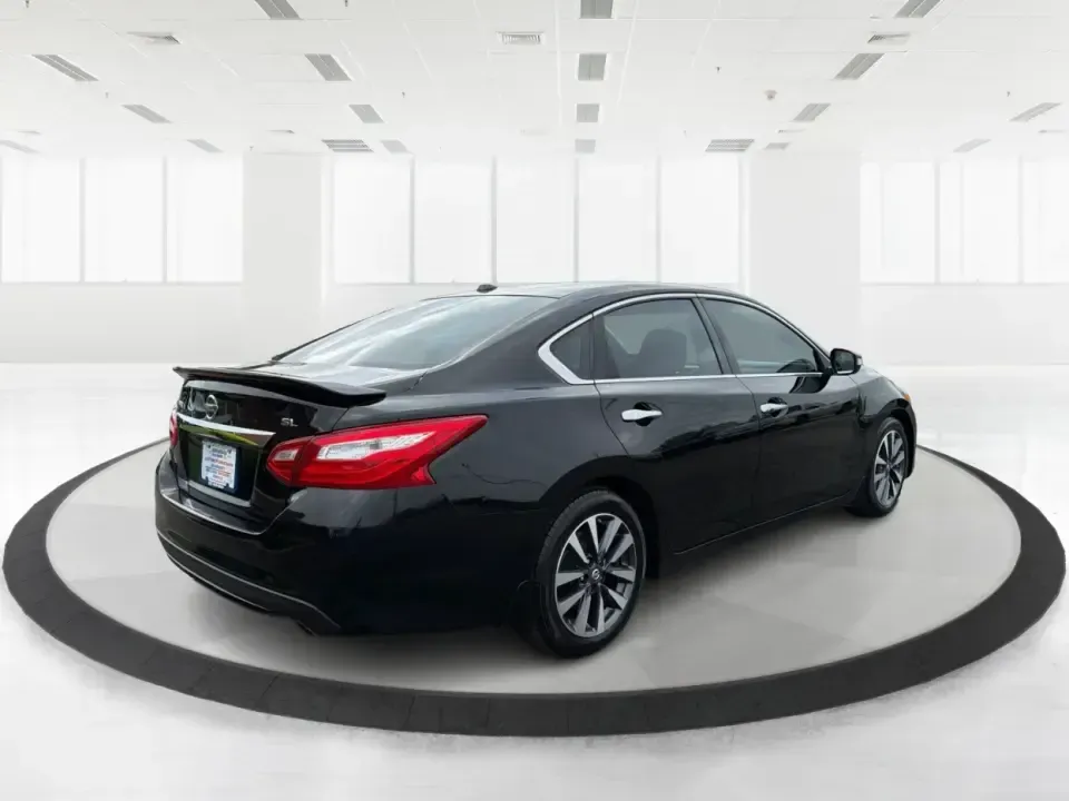 2016 Nissan Altima 2.5 SL (1N4AL3AP1GC) with an 2.5L I-4 DOHC engine, CVT transmission, located at 880 E. National Road, Vandalia, OH, 45377, (937) 908-9800, 39.891918, -84.183594 - Whether you're a Dayton-area commuter stacking highway miles, a busy parent shuttling kids between school and practice, or a weekend road-trip planner who wants comfort without overspending, this **2016 Nissan Altima 2.5 SL** is built for real life. With a sleek **Super Black** exterior and an upsca - Photo#2