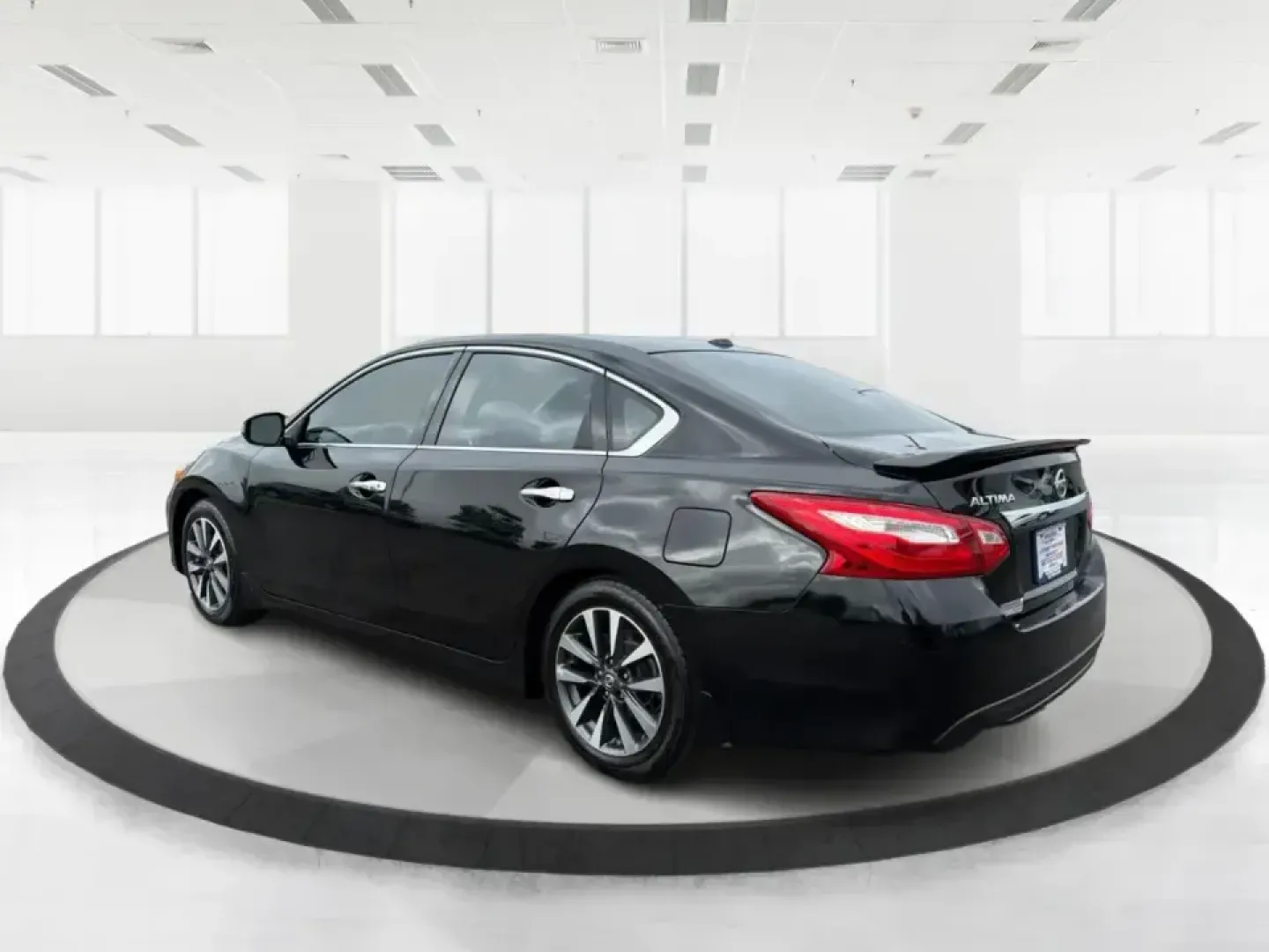 2016 Nissan Altima 2.5 SL (1N4AL3AP1GC) with an 2.5L I-4 DOHC engine, CVT transmission, located at 880 E. National Road, Vandalia, OH, 45377, (937) 908-9800, 39.891918, -84.183594 - Whether you're a Dayton-area commuter stacking highway miles, a busy parent shuttling kids between school and practice, or a weekend road-trip planner who wants comfort without overspending, this **2016 Nissan Altima 2.5 SL** is built for real life. With a sleek **Super Black** exterior and an upsca - Photo#4