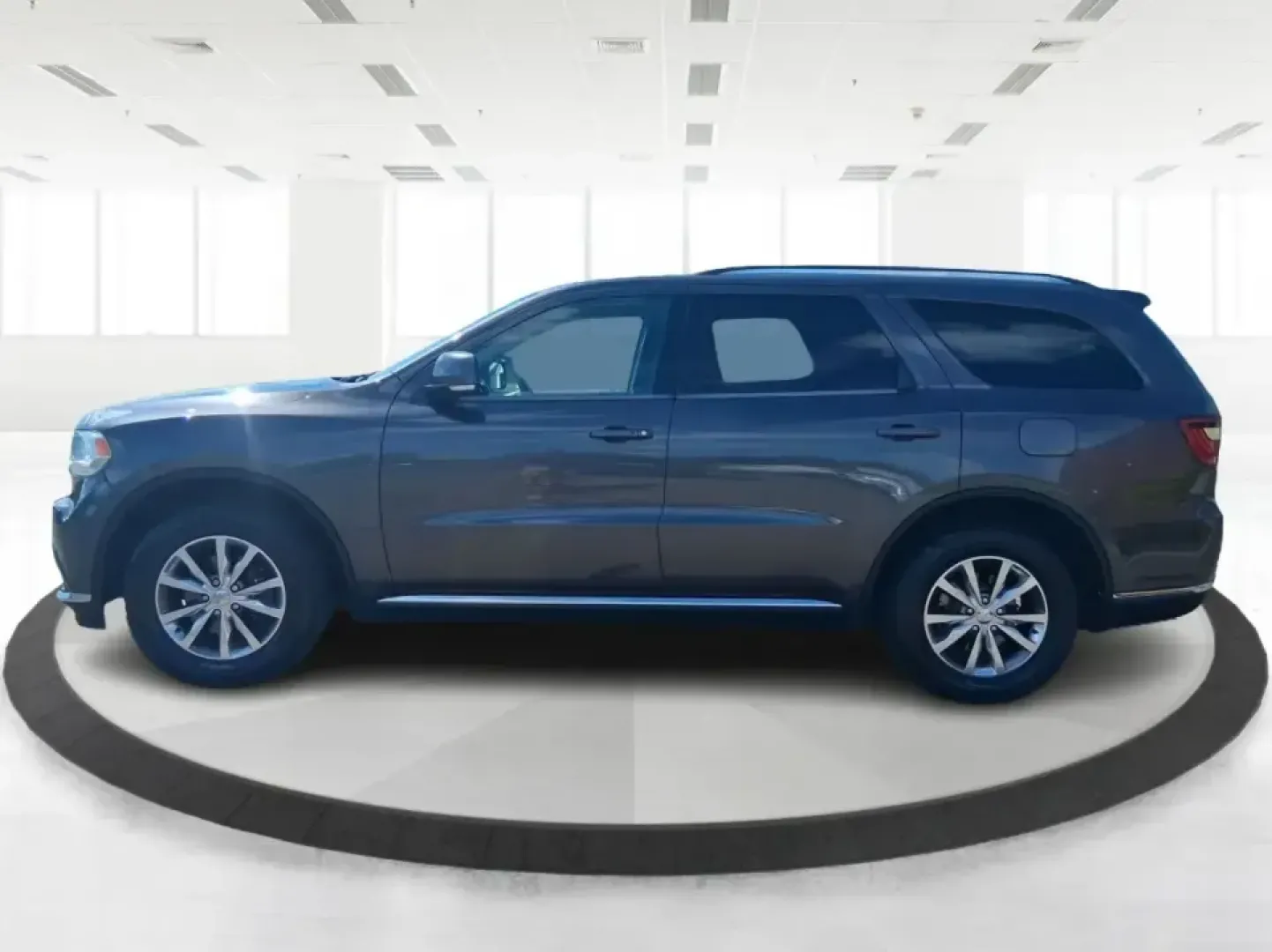 2015 Dodge Durango Limited (1C4RDJDG7FC) with an 3.6L V6 DOHC 24V engine, 8-Speed Automatic transmission, located at 880 E. National Road, Vandalia, OH, 45377, (937) 908-9800, 39.891918, -84.183594 - Pack up the kids, load the cargo, and point the nose toward your next weekend getaway-this 2015 Dodge Durango Limited is built for real life in West Central Ohio. Whether you're shuttling a growing family to practice, commuting up I75, or planning a road trip to Indian Lake, the Durango delivers the - Photo#5