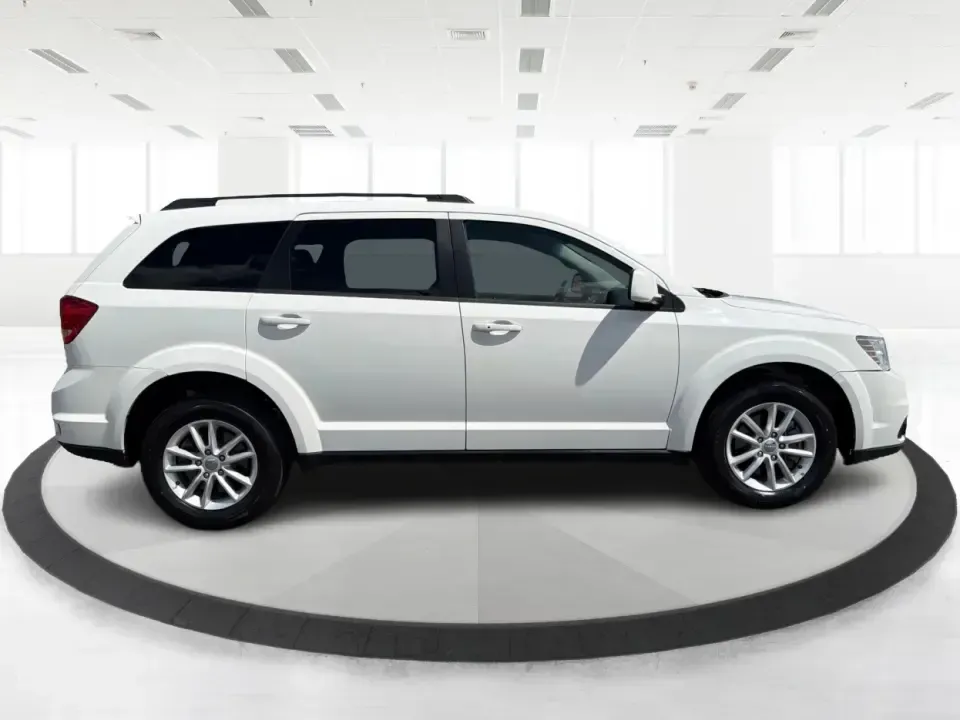 2014 Dodge Journey SXT (3C4PDDBG1ET) with an 3.6L V-6 DOHC engine, 6-Speed Automatic transmission, located at 880 E. National Road, Vandalia, OH, 45377, (937) 908-9800, 39.891918, -84.183594 - Pack up the kids, queue up a playlist, and head out for a weekend getaway-this 2014 Dodge Journey SXT is built for real-life schedules and real-life adventures. Whether you're shuttling to practice, commuting up I-75, or planning a road trip from Vandalia to the National Museum of the U.S. Air Force - Photo#1