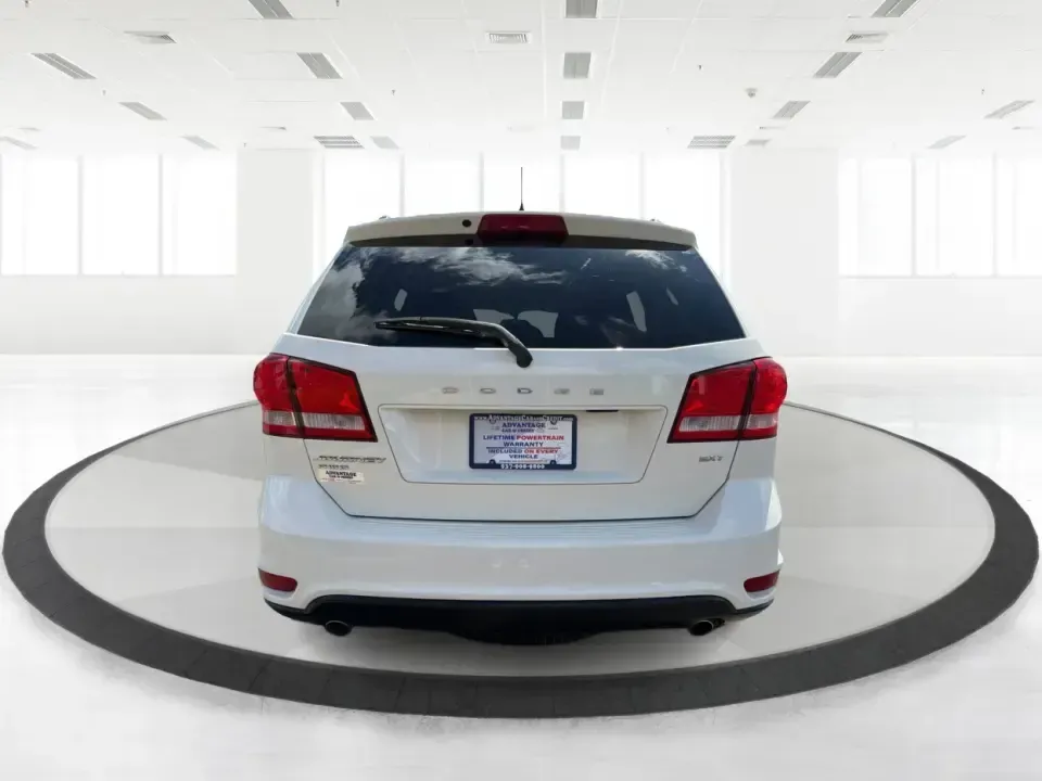 2014 Dodge Journey SXT (3C4PDDBG1ET) with an 3.6L V-6 DOHC engine, 6-Speed Automatic transmission, located at 880 E. National Road, Vandalia, OH, 45377, (937) 908-9800, 39.891918, -84.183594 - Pack up the kids, queue up a playlist, and head out for a weekend getaway-this 2014 Dodge Journey SXT is built for real-life schedules and real-life adventures. Whether you're shuttling to practice, commuting up I-75, or planning a road trip from Vandalia to the National Museum of the U.S. Air Force - Photo#3