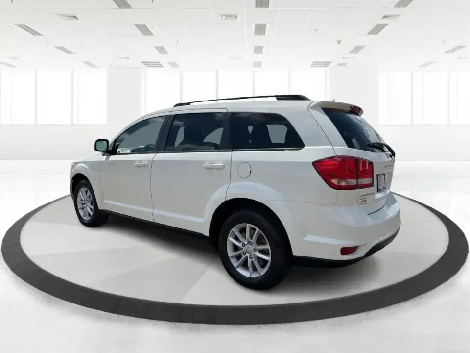 2014 Dodge Journey SXT (3C4PDDBG1ET) with an 3.6L V-6 DOHC engine, 6-Speed Automatic transmission, located at 880 E. National Road, Vandalia, OH, 45377, (937) 908-9800, 39.891918, -84.183594 - Pack up the kids, queue up a playlist, and head out for a weekend getaway-this 2014 Dodge Journey SXT is built for real-life schedules and real-life adventures. Whether you're shuttling to practice, commuting up I-75, or planning a road trip from Vandalia to the National Museum of the U.S. Air Force - Photo#4