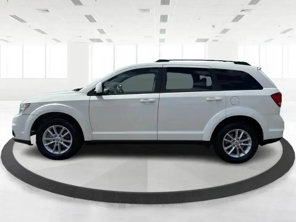 2014 Dodge Journey SXT (3C4PDDBG1ET) with an 3.6L V-6 DOHC engine, 6-Speed Automatic transmission, located at 880 E. National Road, Vandalia, OH, 45377, (937) 908-9800, 39.891918, -84.183594 - Pack up the kids, queue up a playlist, and head out for a weekend getaway-this 2014 Dodge Journey SXT is built for real-life schedules and real-life adventures. Whether you're shuttling to practice, commuting up I-75, or planning a road trip from Vandalia to the National Museum of the U.S. Air Force - Photo#5