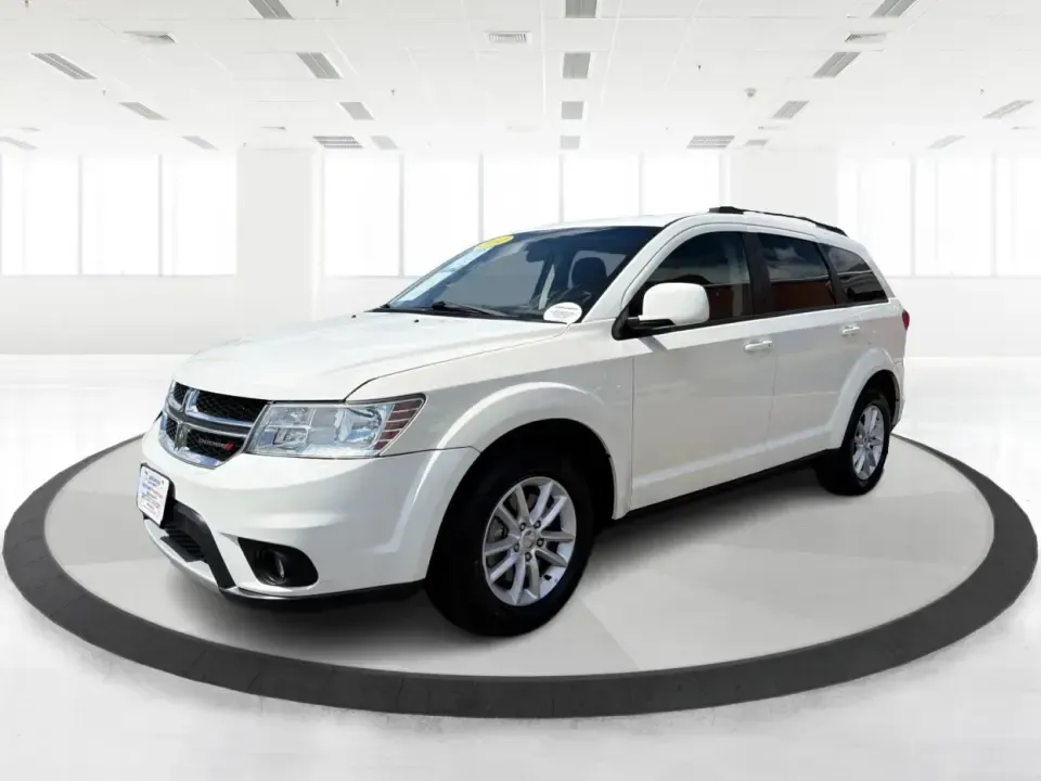 2014 Dodge Journey SXT (3C4PDDBG1ET) with an 3.6L V-6 DOHC engine, 6-Speed Automatic transmission, located at 880 E. National Road, Vandalia, OH, 45377, (937) 908-9800, 39.891918, -84.183594 - Pack up the kids, queue up a playlist, and head out for a weekend getaway-this 2014 Dodge Journey SXT is built for real-life schedules and real-life adventures. Whether you're shuttling to practice, commuting up I-75, or planning a road trip from Vandalia to the National Museum of the U.S. Air Force - Photo#8