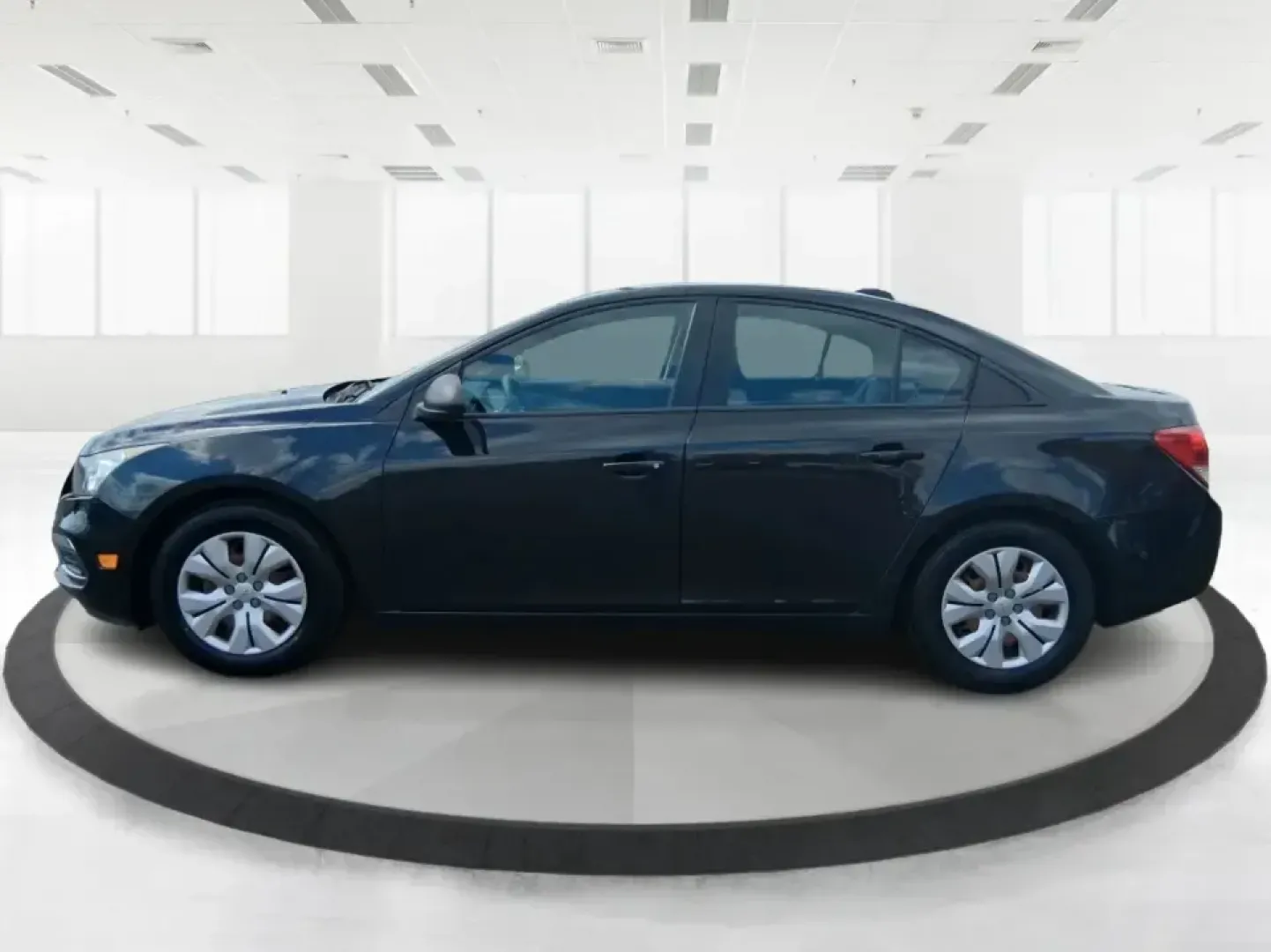 2016 Chevrolet Cruze Limited LS Auto (1G1PC5SH3G7) with an ECOTEC 1.8L I-4 DOHC engine, 6A transmission, located at 4508 South Dixie Dr, Moraine, OH, 45439, (937) 908-9800, 39.689976, -84.218452 - Need a dependable, budget-friendly commuter that can handle the daily grind from Moraine to Downtown Dayton, quick school runs, and weekend errands without feeling like a chore? This **2016 Chevrolet Cruze Limited LS Auto** is a practical sedan that fits real-life routines-great for first-time buyer - Photo#5