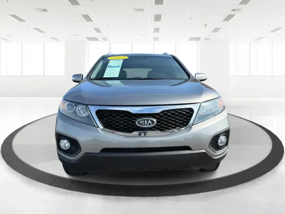 2012 Kia Sorento LX (5XYKT3A64CG) with an 2.4L I-4 gasoline direct injection engine, 6-Speed Automatic transmission, located at 401 Woodman Dr, Riverside, OH, 45431, (937) 908-9800, 39.760899, -84.123421 - Picture your next week going smoother: school drop-offs, the daily commute, grocery runs, and a last-minute weekend road trip-all in one comfortable SUV that fits real life without feeling like a compromise. This 2012 Kia Sorento LX in Satin Metal is the kind of practical, do-it-all sport utility th - Photo#7