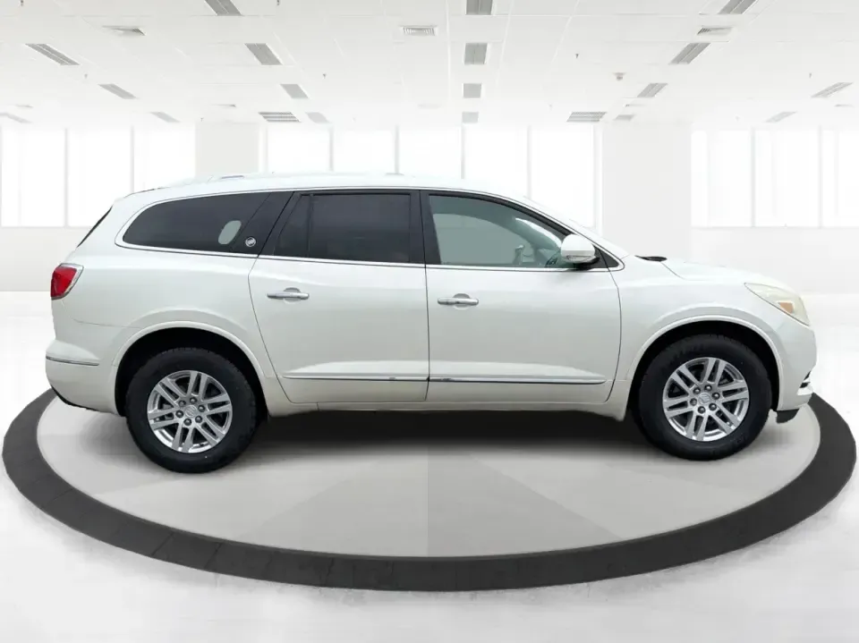 2015 Buick Enclave Convenience (5GAKRAKD6FJ) with an 3.6L V-6 gasoline direct injection engine, 6-Speed Automatic Overdrive transmission, located at 1230 East Main St, Xenia, OH, 45385, (937) 908-9800, 39.688026, -83.910172 - Road-trip weekends, school drop-offs, and stress-free grocery runs get a whole lot easier in a 3-row SUV that's built to keep everyone comfortable. This **2015 Buick Enclave Convenience** in **White Opal** is a smart pick for **growing families**, **busy commuters**, and **budget-conscious buyers** - Photo#1
