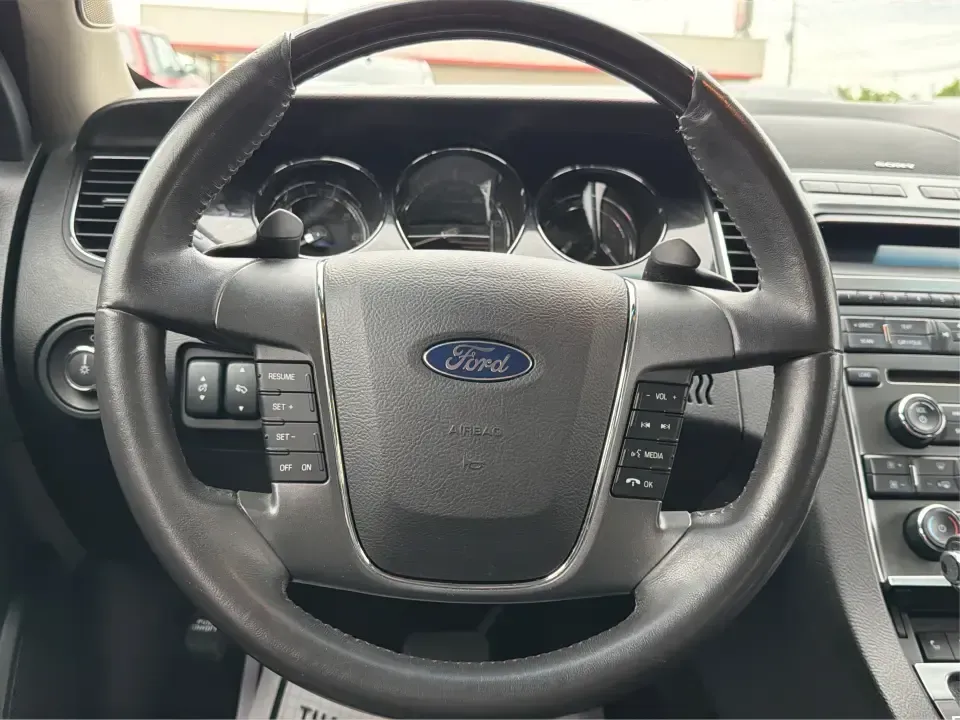 2012 Ford Taurus Limited (1FAHP2FW7CG) with an Duratec 3.5L V-6 DOHC engine, 6-Speed Automatic transmission, located at 401 Woodman Dr, Riverside, OH, 45431, (937) 908-9800, 39.760899, -84.123421 - Need a comfortable, confidence-inspiring sedan for long commutes down I-675, quick errands near The Greene, or smooth weekend drives to Downtown Dayton? This 2012 Ford Taurus Limited is built for real life-quiet, spacious, and loaded with premium features that make every mile feel easier, whether yo - Photo#16