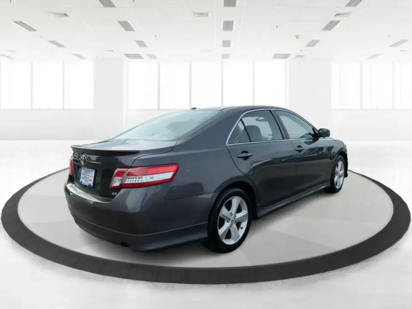 2011 Toyota Camry SE V6 (4T1BK3EK9BU) with an 3.5L V-6 DOHC engine, 6-Speed Automatic transmission, located at 4508 South Dixie Dr, Moraine, OH, 45439, (937) 908-9800, 39.689976, -84.218452 - Need a commuter that can eat up I75 miles all week, then still feel sporty for a Saturday drive past the Great Miami River or out toward the Miami Valley? This 2011 Toyota Camry SE V6 is the kind of practical-yet-fun sedan that fits real life in Piqua-reliable for work runs, comfortable for family e - Photo#2
