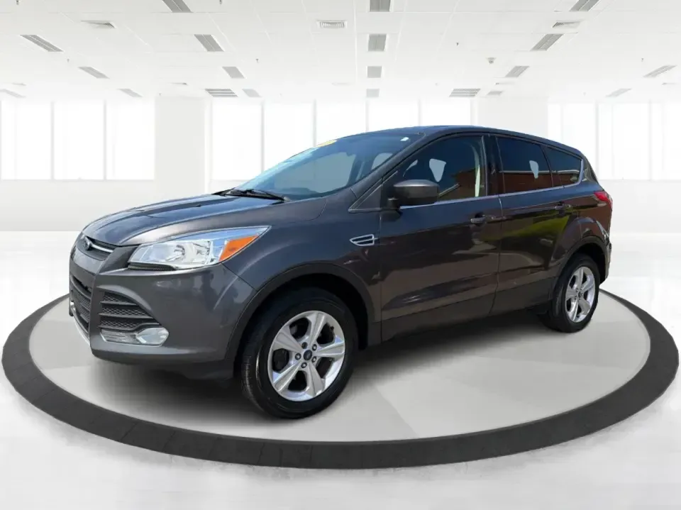 2016 Ford Escape SE (1FMCU0G77GU) with an 2.5L L4 DOHC 16V engine, 6-Speed Automatic transmission, located at 4508 South Dixie Dr, Moraine, OH, 45439, (937) 908-9800, 39.689976, -84.218452 - Whether you're commuting up and down South Dixie Drive, running errands between Moraine and Dayton, or packing up for a weekend getaway, this 2016 Ford Escape SE is the kind of practical SUV that fits real life. It's easy to park, comfortable for daily driving, and versatile enough for everything fr - Photo#8