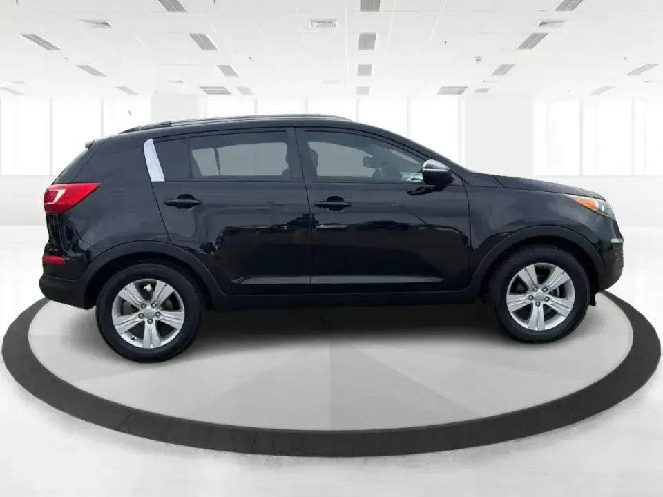 2011 Kia Sportage LX (KNDPB3A25B7) with an 2.4L I-4 DOHC engine, located at 1099 N County Rd 25A , Troy, OH, 45373, (937) 908-9800, 40.057079, -84.212883 - Weekend plans, school drop-offs, and the daily commute all get easier when you have a compact SUV that's comfortable, versatile, and ready for Ohio weather. This 2011 Kia Sportage LX is the kind of crossover that fits real life in Troy-whether you're loading up groceries after a run through town, me - Photo#1