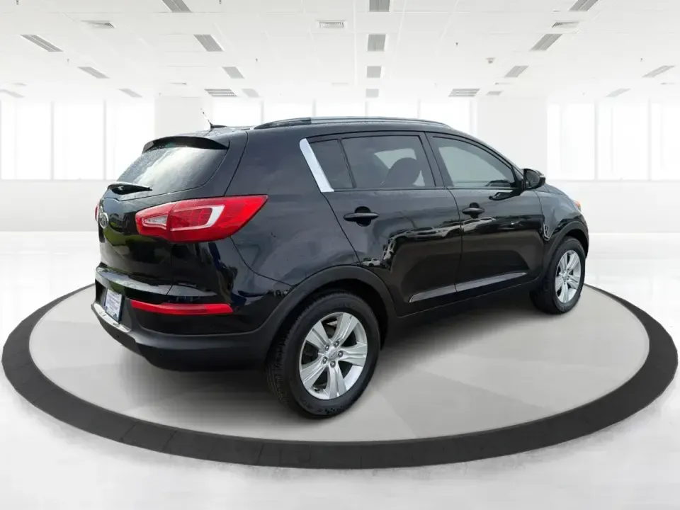 2011 Kia Sportage LX (KNDPB3A25B7) with an 2.4L I-4 DOHC engine, located at 1099 N County Rd 25A , Troy, OH, 45373, (937) 908-9800, 40.057079, -84.212883 - Weekend plans, school drop-offs, and the daily commute all get easier when you have a compact SUV that's comfortable, versatile, and ready for Ohio weather. This 2011 Kia Sportage LX is the kind of crossover that fits real life in Troy-whether you're loading up groceries after a run through town, me - Photo#2