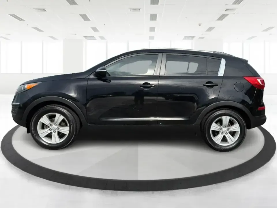 2011 Kia Sportage LX (KNDPB3A25B7) with an 2.4L I-4 DOHC engine, located at 1099 N County Rd 25A , Troy, OH, 45373, (937) 908-9800, 40.057079, -84.212883 - Weekend plans, school drop-offs, and the daily commute all get easier when you have a compact SUV that's comfortable, versatile, and ready for Ohio weather. This 2011 Kia Sportage LX is the kind of crossover that fits real life in Troy-whether you're loading up groceries after a run through town, me - Photo#5