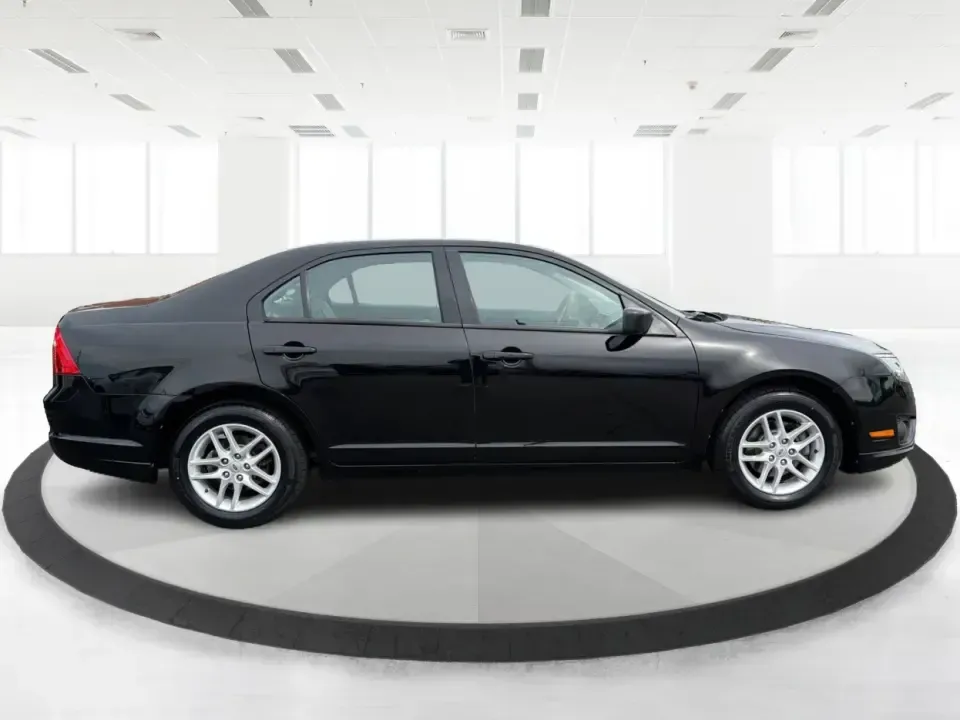 2012 Ford Fusion S (3FAHP0GA3CR) with an 2.5L I-4 DOHC engine, located at 1099 N County Rd 25A , Troy, OH, 45373, (937) 908-9800, 40.057079, -84.212883 - Need a dependable, budget-friendly sedan that can handle the weekday grind and still feel comfortable for weekend errands or a quick road trip to Dayton? This 2012 Ford Fusion S in sleek Tuxedo Black is a smart pick for commuters, first-time buyers, and growing families who want practical transporta - Photo#1